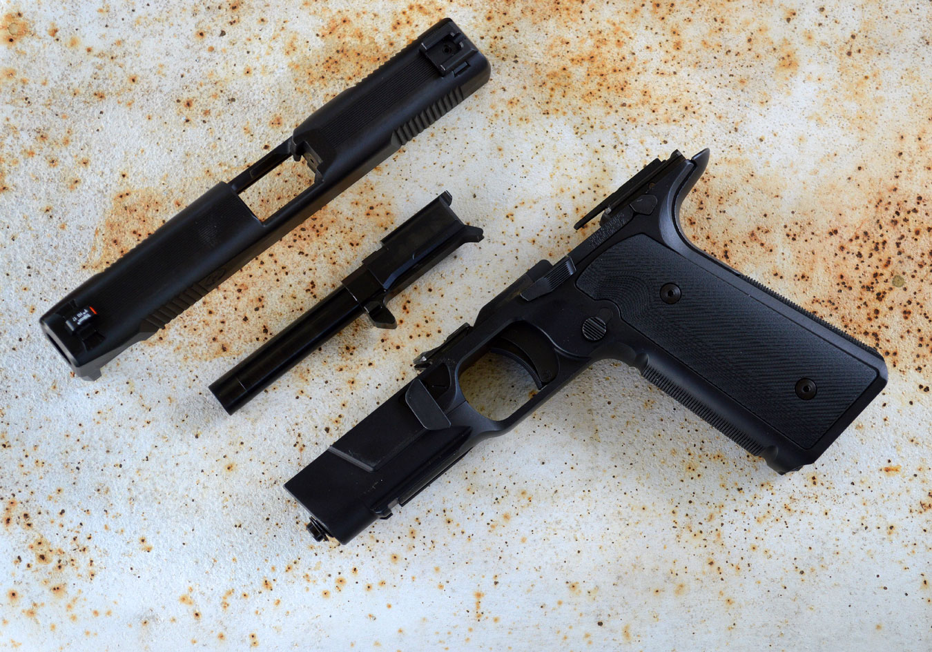 review: hudson h9 9mm — a striker fired 1911?
