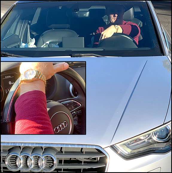 Man in a Mercedes sedan flashing a Rolex watch